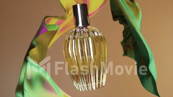 Beauty concept. Perfume bottle on abstract beige background. Pieces of silk fabric fly around the bottle.