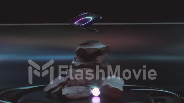 The laptop flies over a pile of stones. Pink dark color. Opens and closes. Neon splash. Neon sphere