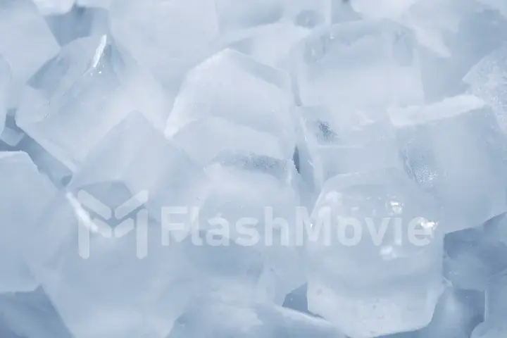 Macro shot of ice cubes from clear water that melt in slow motion on a white background. Concept: pure mountain spring water, ice, cocktails, fresh and frozen foods.