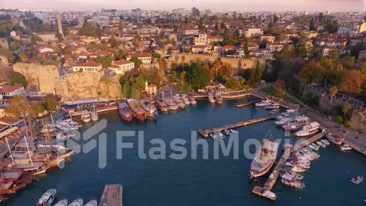 Aerial view of amazing boats. Marina bay. Top view from drone of harbor with yacht, motorboat and sailboat. Seascape