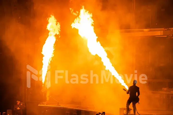 MOSCOW, RUSSIA - JULY 29, 2019: Rammstein group fire concert at Luzhniki Stadium. Crowds of fans gathered at a rock concert of their favorite metal band.