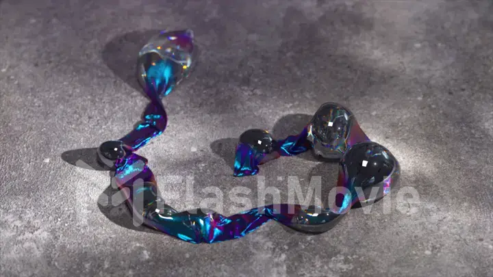 Abstract concept. Transparent iridescent live bubbles are inflated on a thin, shiny blue metallic ribbon.
