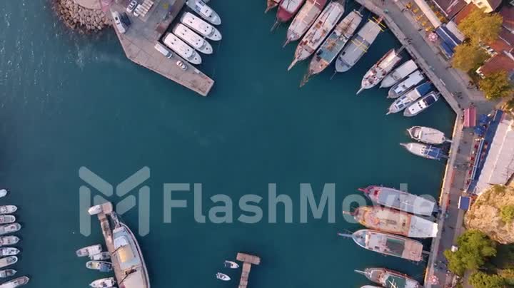 Aerial view of amazing old port. Seascape with boats and sea in marina bay. Top view of the harbor. Drone video footage