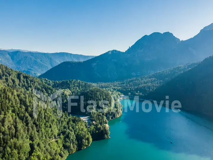 Stunning mountain landscape with a crystal clear blue lake. Aerial view