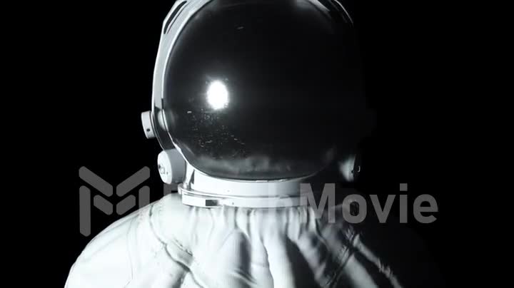 Circular light flashes around an astronaut