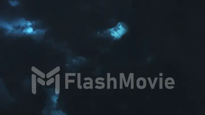 Storm clouds at night over the sea and sparkling lightning in the clouds