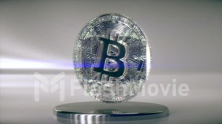 Cryptocurrency mining concept. Diamond bitcoin rotates on a metal platform. Coin. 3d animation of seamless loop
