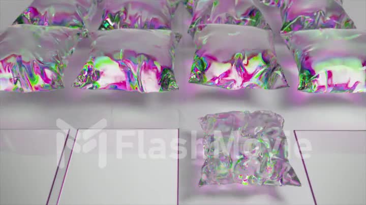 Diamond pillows are inflated from flat gray squares. Cushion. Glossy metallic color. Rainbow. 3d animation