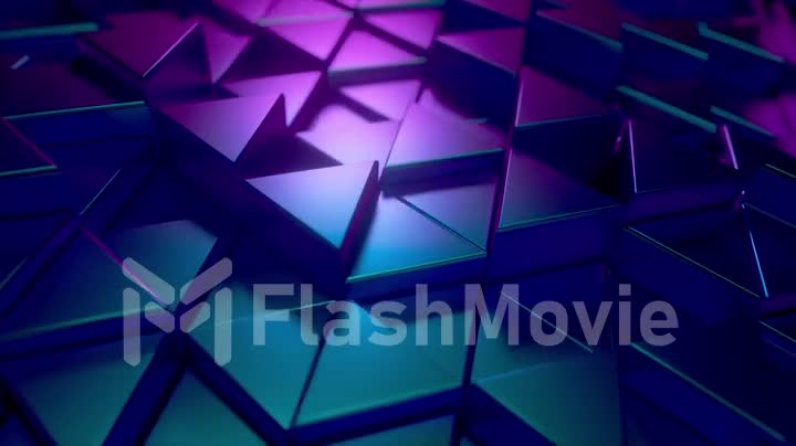 Abstract background of metal glossy triangles. Modern fashion lighting. Seamless loop 4k animation