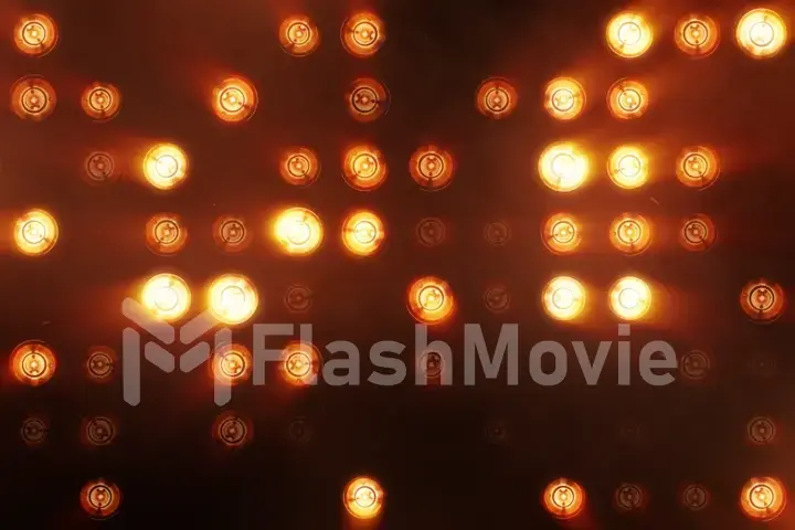 The wall of incandescent lamps is bright orange. LED background