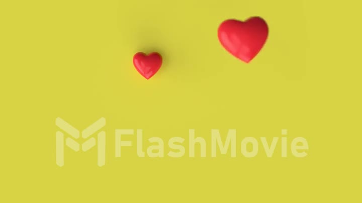 Falling red hearts forming a smiling emoticon on a yellow background. 3d animation