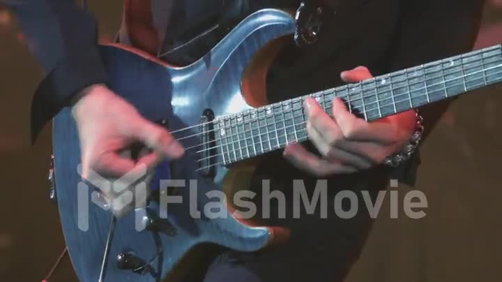 A virtuoso guitarist playing an electric guitar