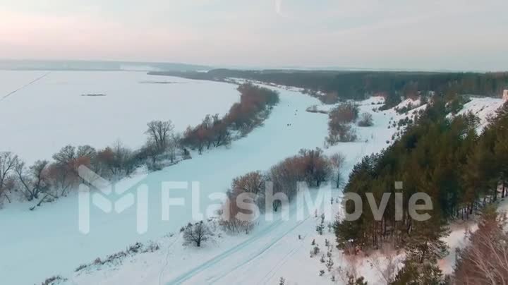 4k Aerial View Snow Covered Trees River Drone Footage Landscape Winter Nature Beautiful On A Sunny Day