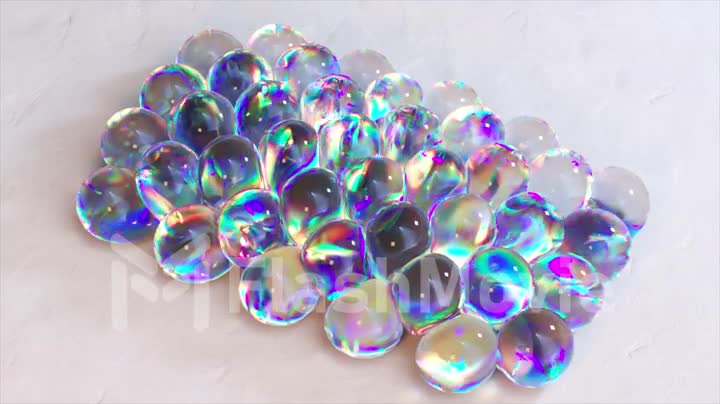 Transparent bubbles with rainbow liquid inside are inflated on a grid of circles. 3d animation