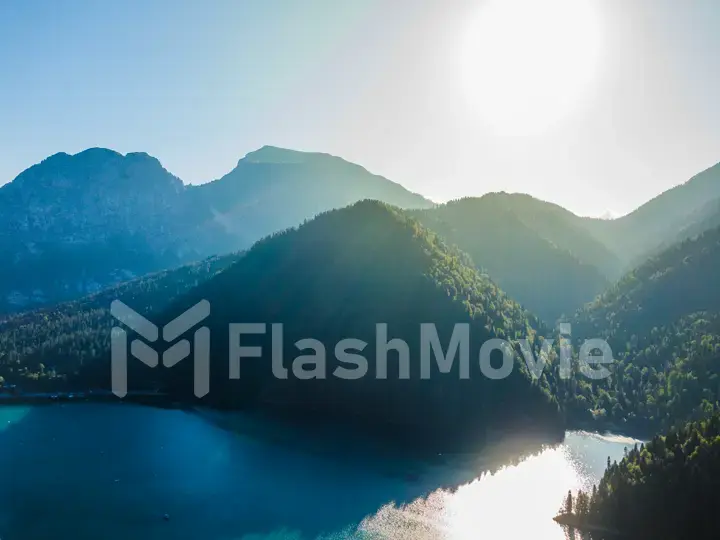 Stunning mountain landscape with a crystal clear blue lake. Aerial view