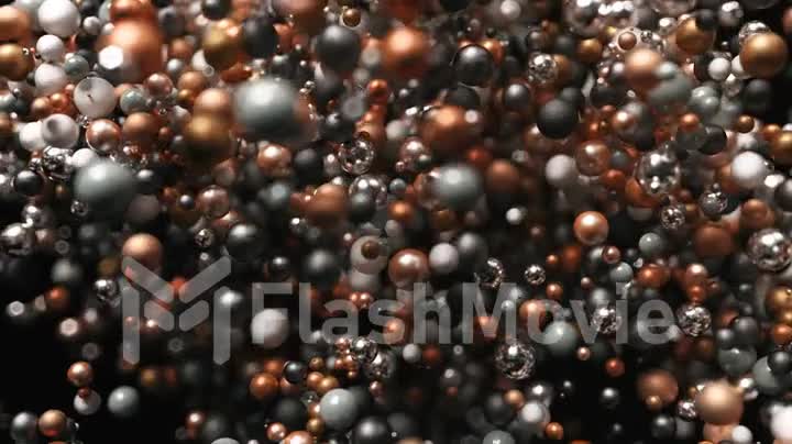 Abstract graphic background with metal spheres. High-quality 3d render. Texture balls move in a chaotic manner on black isolated bacgkround.