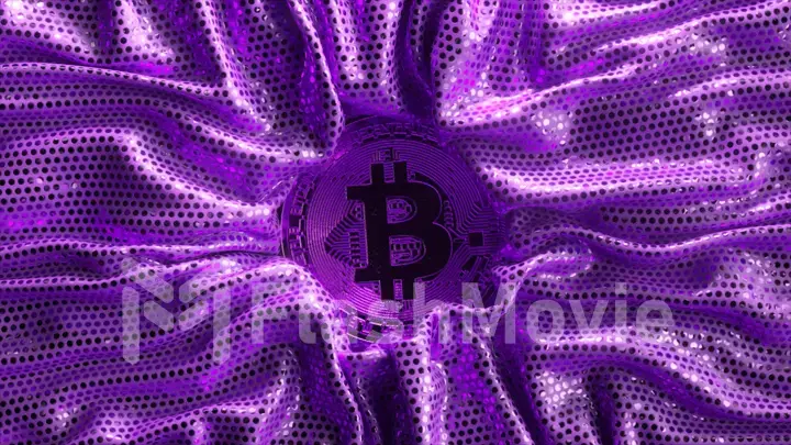 Cryptocurrency concept. The crumpled purple shiny fabric is straightened out and the bitcoin is opened.