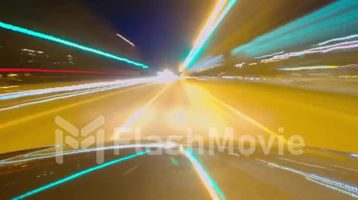 Time lapse of driving a car in the city at night