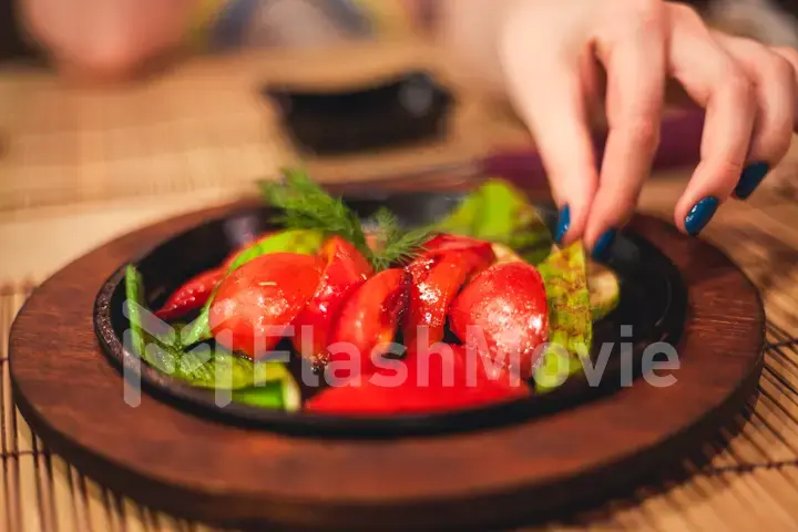 Grilled vegetables on a cast-iron plate. Food background