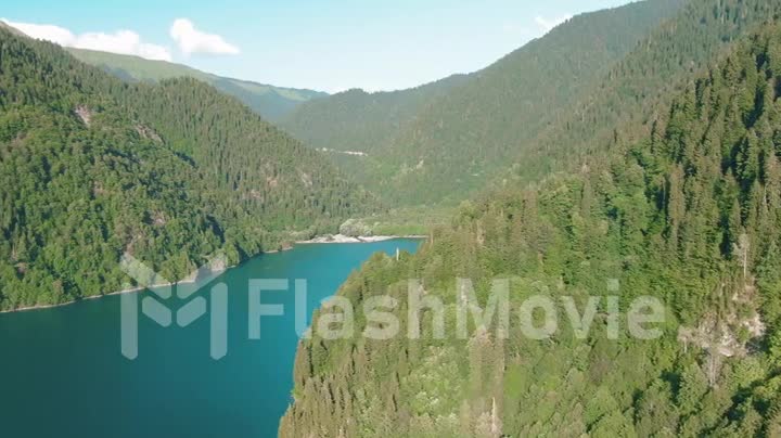 Aerial 4k view. Flying over the beautiful mountain ranges at dusk. Powerful cliffs and gorges