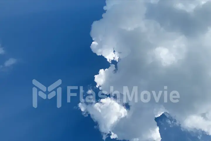 Background of lush clouds and blue sky