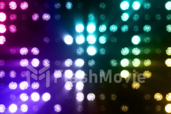 Bright flood lights flashing abstract colorful background