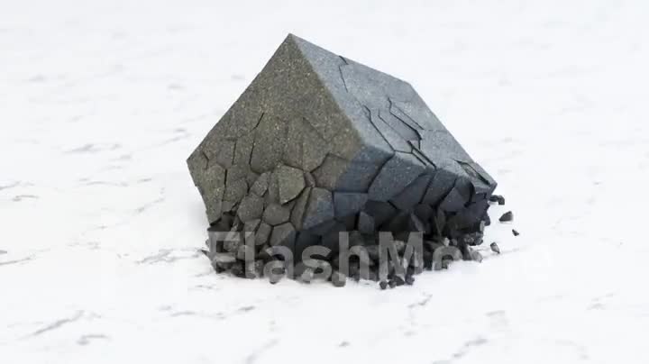 A cube of stone shatters