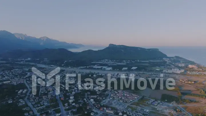 Top view. Panoramic view of the resort town. Sea on the horizon. Photography. Beautiful seascape.