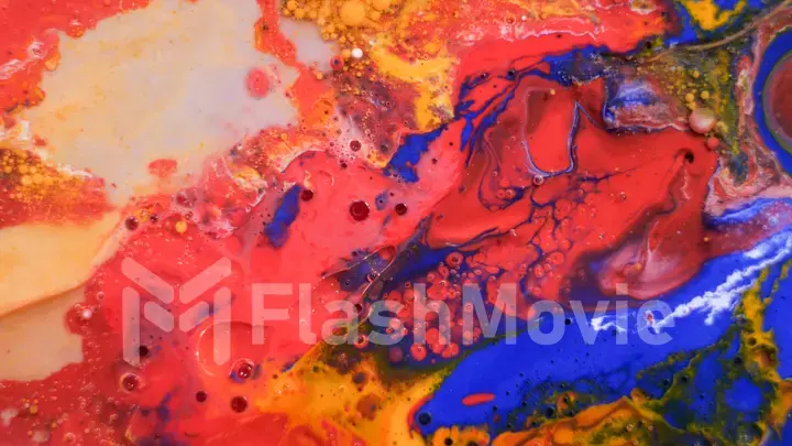 Bright colorful multicolored bubbles on the surface of the water. Abstract paint bubbles