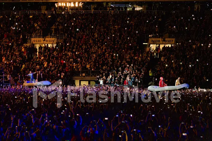 MOSCOW, RUSSIA - JULY 29, 2019: Rammstein group fire concert at Luzhniki Stadium. Crowds of fans gathered at a rock concert of their favorite metal band.