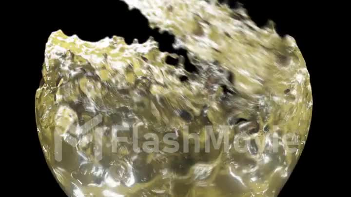 Spectacular alcohol pouring isolated on black background in slow motion with alpha matte