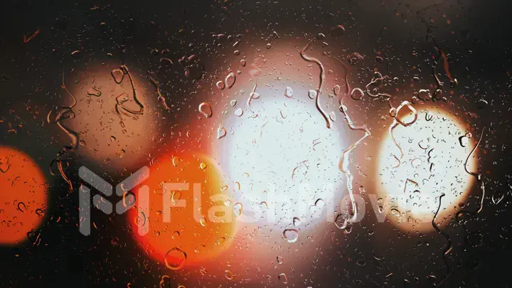 Drops of rain flow down the glass against the bokeh background of moving cars