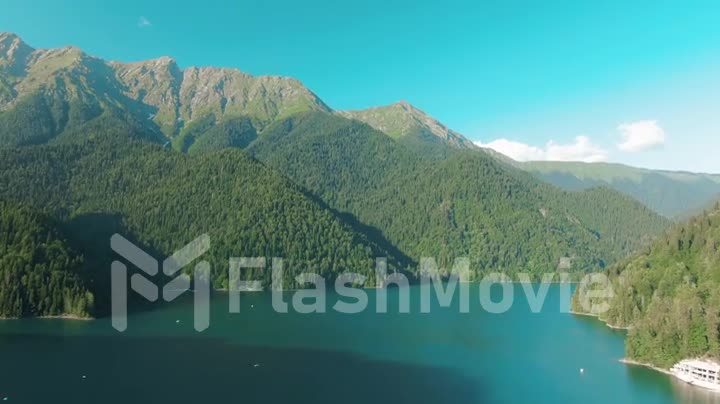 Aerial 4k view. Flying over the beautiful mountain ranges at dusk. Powerful cliffs and gorges