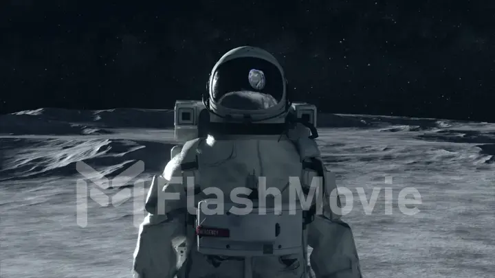 An astronaut stands on the surface of the moon among craters against the backdrop of the planet earth. Reflection of the earth in the glass of the spacesuit helmet. 3d illustration