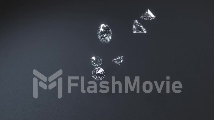 Diamonds falling and beat on the gray texture surface in slow motion