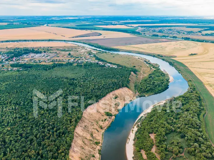 aerial landscape of winding river in green field, top view of beautiful nature texture from drone