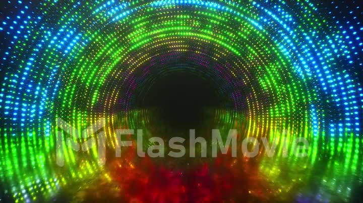 Bright light tunnel of luminous multi-colored dots and a reflective metal scratched texture floor. Light tunnel stage for your video backgrounds, concert visual performance. Seamless loop 3d render