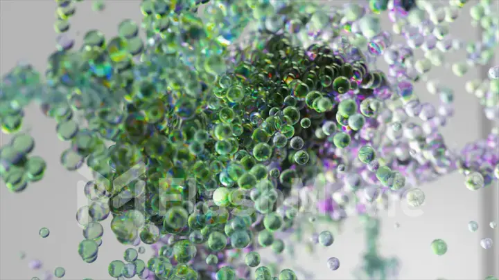 A swirl of colorful bubbles on a gray isolated background. 4k video animation with surreal liquid color mixing splash