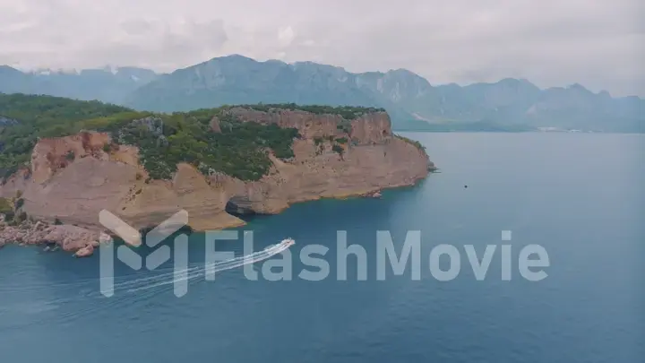 Beautiful seascape. Top view of beaches, rocky shore covered with green trees. Photography