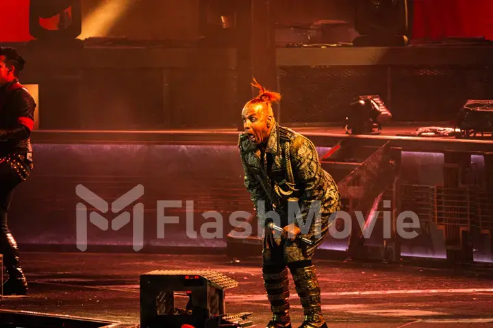 MOSCOW, RUSSIA - JULY 29, 2019: Rammstein group fire concert at Luzhniki Stadium. Crowds of fans gathered at a rock concert of their favorite metal band.