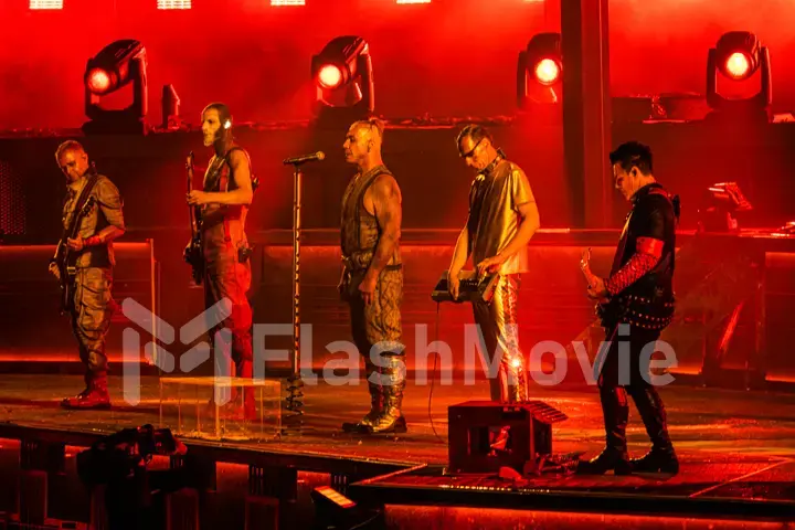 MOSCOW, RUSSIA - JULY 29, 2019: Rammstein group fire concert at Luzhniki Stadium. Crowds of fans gathered at a rock concert of their favorite metal band.