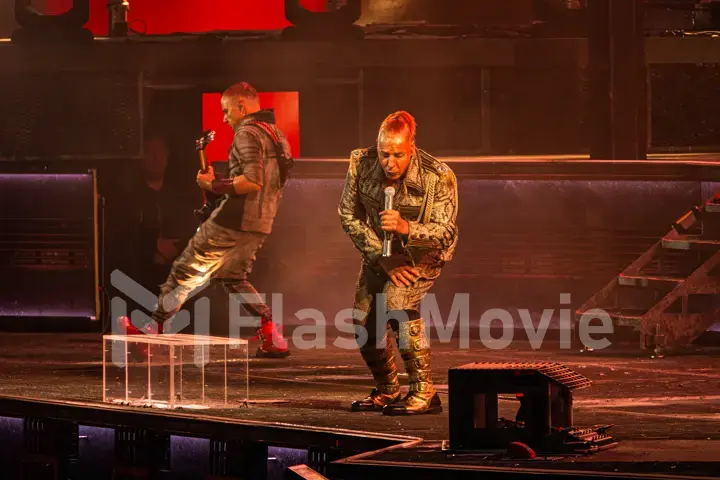 MOSCOW, RUSSIA - JULY 29, 2019: Rammstein group fire concert at Luzhniki Stadium. Crowds of fans gathered at a rock concert of their favorite metal band.