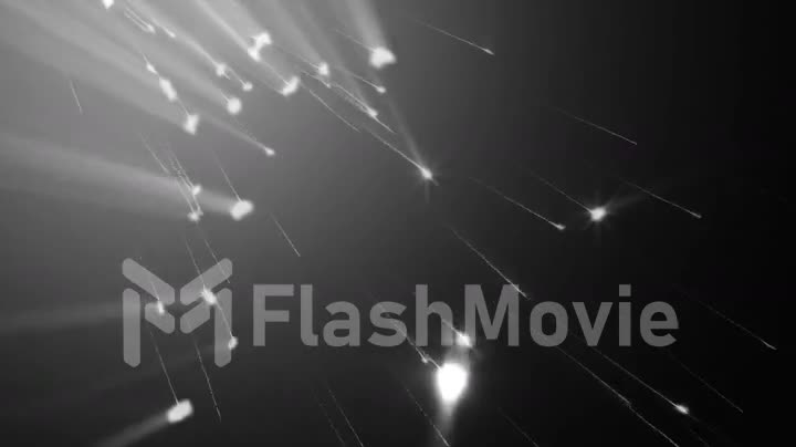Abstract animation of the fall of sparkling meteorites on a black background