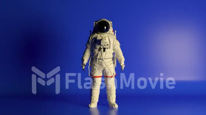 Abstract space concept. The astronaut stands on a blue isolated background with changing lighting. Chroma key. Helmet.