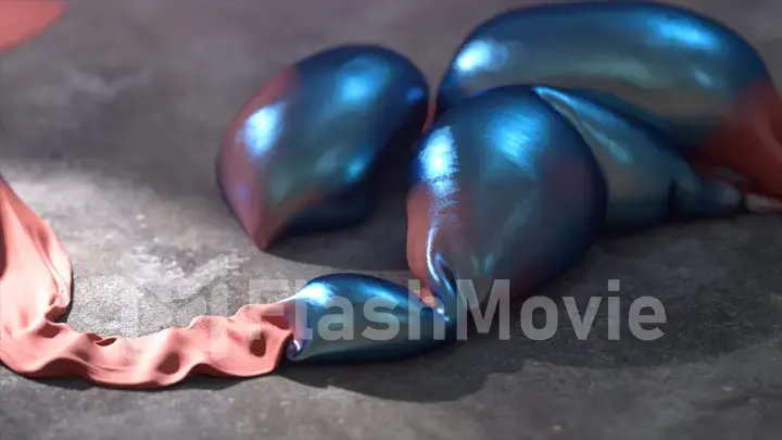 The concept of transformation. Large blue shiny metallic bubbles are inflated from a thin red strip. Advertising.