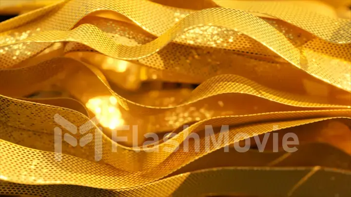 Shiny gold ribbons move quickly and slow down in space. Abstract background. Slow motion. 3d illustration