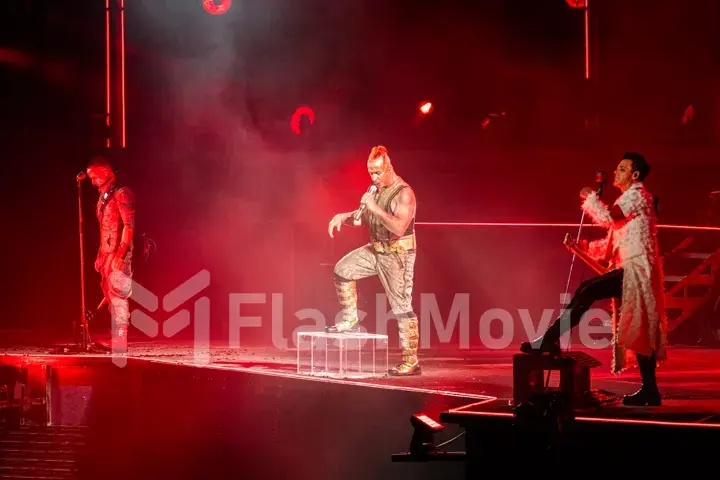 MOSCOW, RUSSIA - JULY 29, 2019: Rammstein group fire concert at Luzhniki Stadium. Crowds of fans gathered at a rock concert of their favorite metal band.