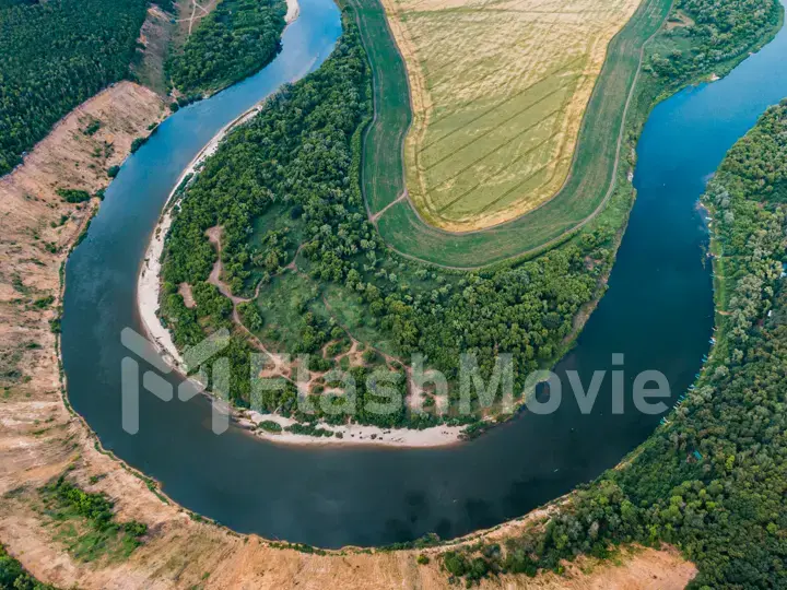 aerial landscape of winding river in green field, top view of beautiful nature texture from drone