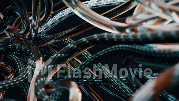 Multi-colored and transparent wires, curved and tangled, create an aesthetic confusion. Black isolated background.