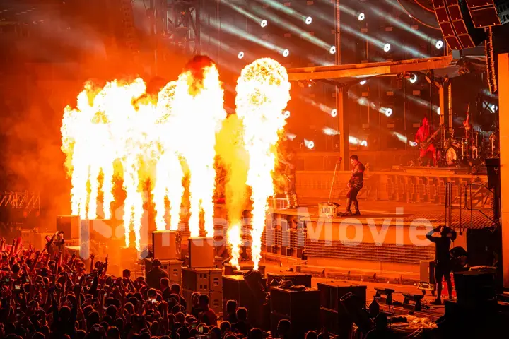 MOSCOW, RUSSIA - JULY 29, 2019: Rammstein group fire concert at Luzhniki Stadium. Crowds of fans gathered at a rock concert of their favorite metal band.